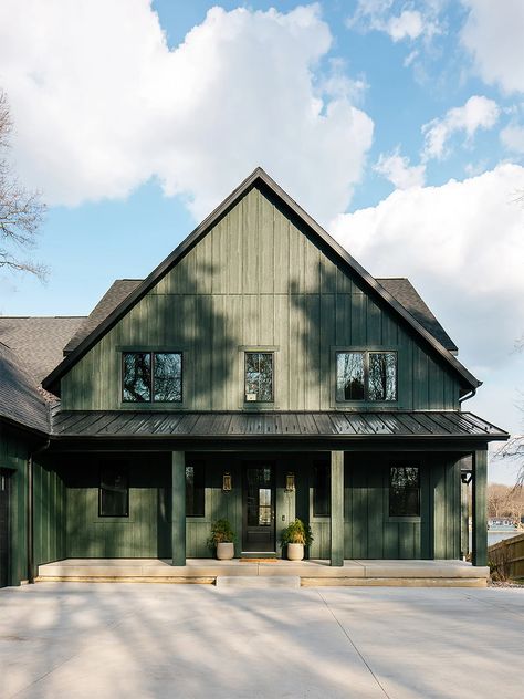 Wood Cabin Exterior Colors, Green Exterior House Colors 2023, Forest Cabin Exterior, Barndominium Paint Colors, Dark Green Barndominium, Vertical Siding Exterior Ranch, Barn Colors Scheme Exterior, Green Painted House, Green Color House