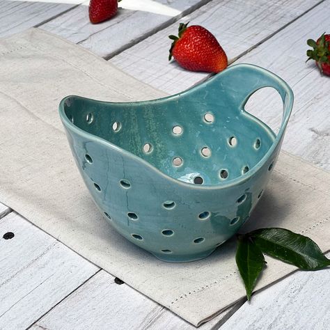 Turquoise Treasure Berry Bowl; Super beautiful, clean, useful, unique and handmade. Clean 'em up, drain and enjoy your berries while displaying this individually made berry bowl with your friends and family.Porcelain7 X 4 1/4Dishwasher safeAll my pottery is hand thrown or hand built by me:) Berry Bowls Pottery, Ceramic Berry Bowl, Berry Colander, Tiny Bowls, Contemporary Pottery, Cerámica Ideas, Pottery Handbuilding, Pottery Techniques, Berry Bowl