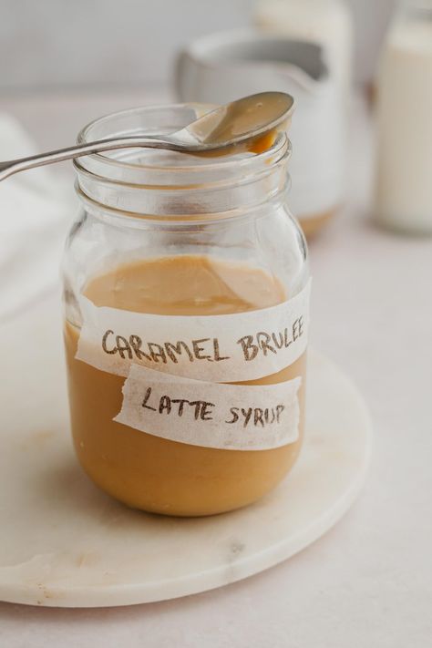 Make Starbucks Caramel Brulee Latte Syrup with this simple recipe. Then, save time and money by making your favorite holiday latte at home! Starbucks Caramel Brulee Latte, Starbucks Caramel Brulee, Caramel Brulee, Caramel Creme Brulee, Homemade Coffee Syrup, Caramel Brulee Latte, Latte At Home, Coffee Creamer Recipe, Drink Syrups