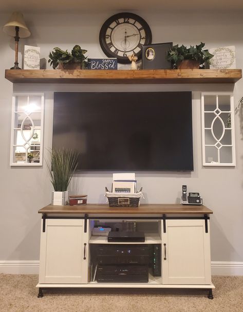 Western Tv Wall Ideas, Living Room Revamp, How To Decorate A Entertainment Center, Decorate Tv Stand Living Rooms, How To Decorate Around Mounted Tv, Wall Decor By Tv On Wall, Tv Stand Organization Ideas, How To Decorate Above Tv Living Rooms, Summer Tv Stand Decor