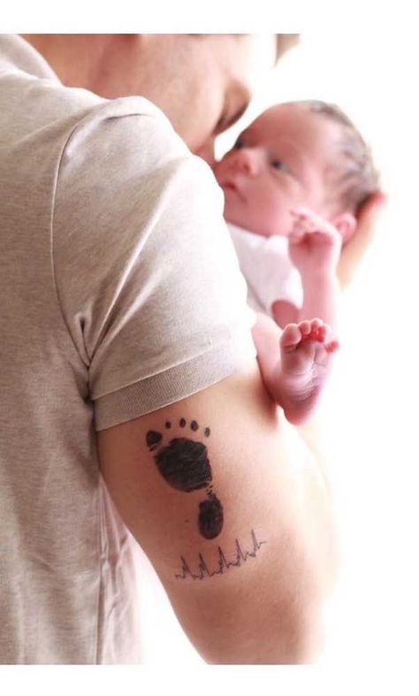 Baby Tattoo Designs Dad, Baby Feet Tattoos For Dad, Baby Footprint Tattoo For Dad, Baby Feet Tattoos Footprint, Baby Name Tattoos For Dads, Tattoo Ideas For Baby Boy, New Baby Tattoo Ideas, Newborn Tattoo Ideas Father, Baby Tattoos For Dads