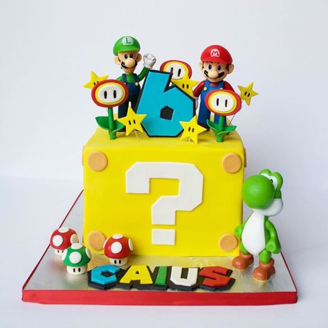 Looking for Super Mario Cake Designs? We list 15 insanely cute Mario birthday cakes that are perfect for your themed party. Take a look, you will find a couple that you will absolutely love Mario Kart Party, Mario Bros Birthday Party Ideas, Mario Birthday Cake, Mario Bros Cake, Super Mario Cake, Super Mario Bros Birthday Party, Mario E Luigi, Super Mario Bros Party, Mario Cake