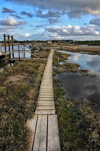 Old wooden walkway to the moorings at Thornham in Norfolk Blakeney Norfolk, Norfolk Beach, Counties Of England, Norfolk Uk, North Norfolk, Norfolk Broads, Wooden Walkways, Norfolk England, Norfolk Coast