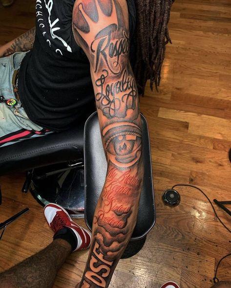 Arm Tattoo Men Red Ink, Red Ink Forearm Tattoo, Forearm Tattoo Black Men, Black Men Tattoos Sleeve, Dark Skin Tattoo Men, Black Men Sleeve Tattoo Ideas, Full Arm Tattoo Men, Red Ink Tattoos Men, Red And Black Tattoo Ideas