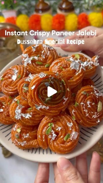 Foodie Gujarati on Instagram: "Instant Crispy Paneer Jalebi | Dussehra Special Recipe 
.
Ingredients 
Paneer - 200 gm
Arrowroot Powder - 20gm
Maida - 50gm
Water - 3 tbsp
Saffron soaked - 1 tsp
Grind properly and give rest for 15-20 minutes 

Chasni:
Sugar - 400gm
Water 200ml
Soaked Saffron 
Cardamom Powder 

#VimalOil #ChangeForHealth  #KiarasChoice #WellnessWithVimal #EdibleOil #Dussehra
#GharGharKaPyaraVimal #navratrispecial #durgapoojaspecial  #yum #navratri  #healthy #food #festival #foodblogger #food #foodie #healthyfood #foodpics #yumm #yummy #delicious #cooking #trending #viralreels #viral #foodlover #instafood #foodism #yummyfood" Paneer Dessert Recipes, Paneer Jalebi, Gulab Jaman, Fusion Indian Desserts, Jaggery Sweets Indian Cuisine, Easy Indian Fusion Desserts, Fusion Sweets For Diwali, Crispy Paneer, Bangladeshi Sweets