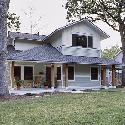 The original plan for this 1940s bungalow served as a solid foundation for dramatic expansion. Adding a second story doubled the home's square footage. On the exterior, wide overhangs, broad windows, and bands of horizontal color give the home an inviting appearance and help it blend with its natural surroundings./ Ranch Remodel Before And After, Homemaking Projects, Craftsman Front Porch, Farm Porch, 1940s Bungalow, Front Porch Remodel, Second Floor Addition, Second Story Addition, Folk Victorian