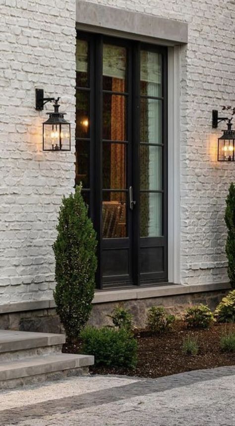 Black House With Light Stone, Light Grey Brick House Exterior, White Brick Grey Stone Exterior, Painted Brick Homes Exterior, Light Grey Painted Brick, Light Gray Painted Brick, Exterior Brick Makeover, White Brick Transitional Exterior, Grey Brick House Exterior