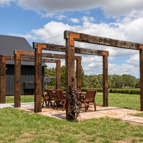 Our UK Oak Sleepers in action! Check out this impressive pergola by Luijten Landscaping. Durable, rustic, and sustainably sourced. #LandscapeDesign #OakSleepers Pergola 3 Post, Recycled Timber Pergola, Railway Sleeper Pergola, Cantalievered Pergola, Timber Sleeper Garden Bed, Oak Sleepers, Woodworking Projects, Landscape Design, Pergola