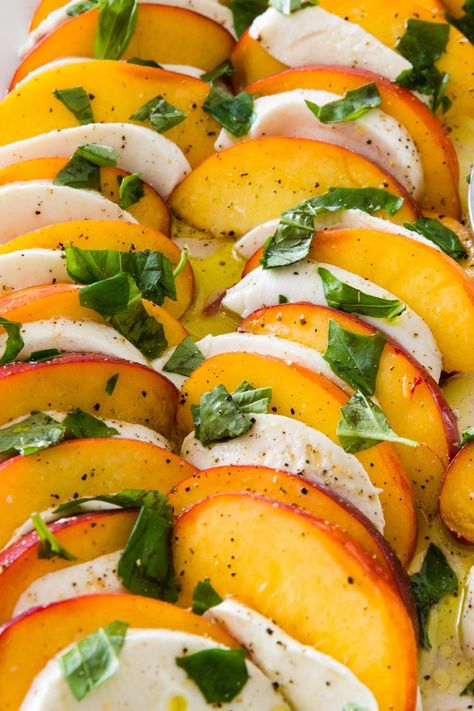 Peach Caprese Salad: Ripe fresh peaches with mozzarella and a simple lemon-and-oil vinaigrette preserve the simplicity of a Caprese salad with a twist. Peach Caprese Salad, Peach Caprese, Tomato Caprese, Country Dinner, Caprese Salad Recipe, Summertime Recipes, Mozzarella Salad, Peach Salad, America's Test Kitchen Recipes