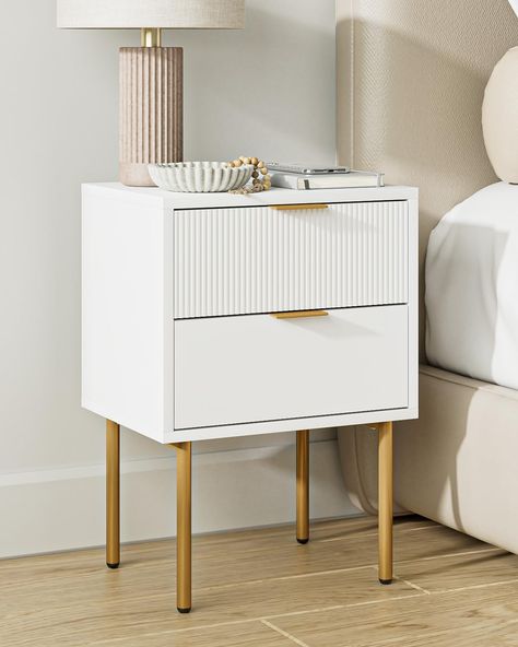 PRICES MAY VARY. Simple and Modern Design White Nightstand: classic white and matte gold design, creating a simple and modern atmosphere, suitable for various styles of home decoration. Add elegance to your home life and accompany you through every day. Ample Storage Space: This nightstand is small but has a lot of space. A bedside table with a drawer and open shelves for storing books, glasses, medicines, or personal essentials helps to keep the room tidy and organized. The wide top is perfect Room Items Bedrooms, Gold Side Tables Bedroom, Bedside Night Stands Ideas, Cute Bed Side Tables, White And Gold Minimalist Bedroom, White And Gold Furniture Bedroom, White Bed Side Tables, Cute Bed Side Table, Dream Bedroom Decor