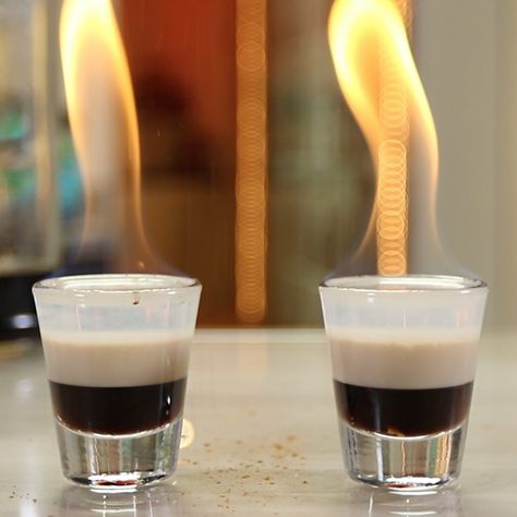 If you're looking for a beautifully layered flaming shot, you need to check out this Flaming Pumpkin Pie Shot. This crazy Goldschläger shot mixes up coffee liqueur, Irish cream, Goldschläger, and pumpkin pie spice, and is perfect as a little hot autumn cocktail. Pumpkin Pie Drink, Flaming Cocktails, Fall Shots, Flaming Shots, Flaming Drinks, Layered Shots, Autumn Cocktail, Cinnamon Schnapps, Cocktail Inspiration