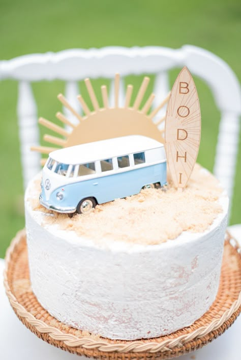 Celebrate your little surfer dude's first wave with our Surfside inspired cake topper. Made from natural birch wood, the custom engraved surfboard adds a personal touch, while the acrylic sun adds dimension and offers a backdrop for additional decor. Add a bit of sugar sand to your cake for the ultimate beachside surf inspired soirée. Item Details * 1 Wooden Personalized Surf Cake Topper, engraved with name  * Acrylic Sun Topper in mustard  * Made from 1/8" baltic birch and 1/8" acrylic 𝗗𝗢𝗘𝗦 First Beach Birthday, Surfer First Birthday Boy, The Big One Surf Birthday Cake, The Big One Surf Backdrop, Surf Theme Birthday Cake, First Wave Birthday Party, The Big One Cake Topper, Surf Birthday Cake, Beach First Birthday Party