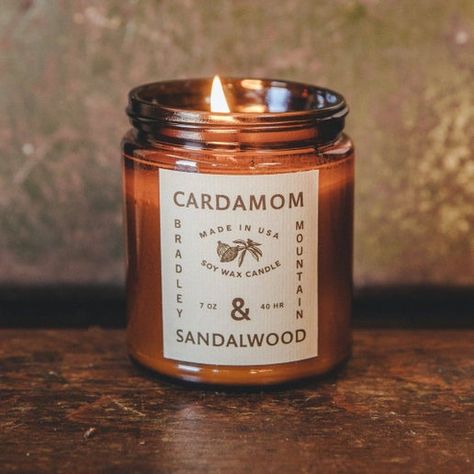 From our Amber Candle series: Cardamom & Sandalwood. Notes: Cardamom, White Pepper, & Sandalwood Diameter: 3 in Height: 3 in Approx. Net Wt: 8 oz Approx. Burn time: 40+ hours Infused with Natural Essential Oils Never Test On Animals Phthalate Free Made in USA - In House Sandalwood Candle, Candle Labels Design, Citrus Candle, Amber Candle, Candle Making Business, Candle Labels, White Pepper, Hand Poured Candle, Best Candles