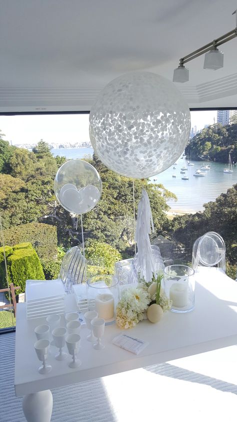 3ft clear jumbo balloon with white confetti and white tassel garland. www.balloons.net.au Large Clear Balloons, Clear Balloons Centerpieces, White Balloon Centerpieces, Balloon Wedding Centerpieces, Clear Balloon Ideas, Clear Balloons With Confetti, Jumbo Balloons, Clear Balloons, White Confetti