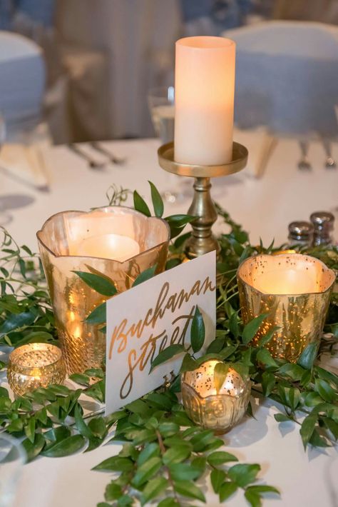 Centerpieces | gold and greenery |candles Winter Table Centerpieces, Gold Wedding Centerpieces, Greenery Wedding Centerpieces, Winter Wedding Table, Wedding Candles Table, Gold Wedding Theme, Wedding Reception Centerpieces, Gold Wedding Decorations, Wedding Floral Centerpieces