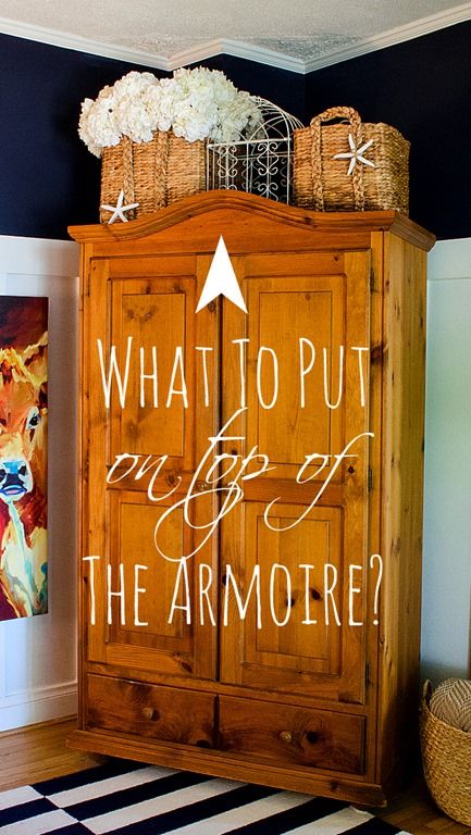 How To Style A Cabinet Top Styling Top Of Armoire Living Rooms, How To Style The Top Of An Armoire, Dining Room Armoire Ideas, Baskets On Top Of Hutch, Top Of Wardrobe Decor, Top Of Hutch Decor Ideas, Top Of Armoire Decor, Decorating Top Of Hutch, Top Of Hutch Decor