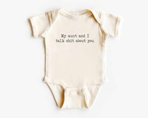 Announce to the world that nothing can come between you and your aunt with this adorable onesie! Made from natural cotton, this cute and funny bodysuit is sure to bring laughter and smiles wherever you go! Perfect for any aunt and niece duo that enjoys a good laugh! Products Detail: 100% combed ring-spun cotton (fiber content may vary for different colors) Infant unisex fit Light fabric Innovative three-snap closure Tagless. Easy Tear-away label Maybe you like this collection: Neutral outfit Com Take Me To My Aunt You Peasant Onesie, Niece Gifts From Aunt, Auntie Baby Onesies, Auntie Onsies For Babies, Aunt Onesies, Aunt Duties, Baby Onsies Ideas, Going To Be An Aunt, Aunt Onesie