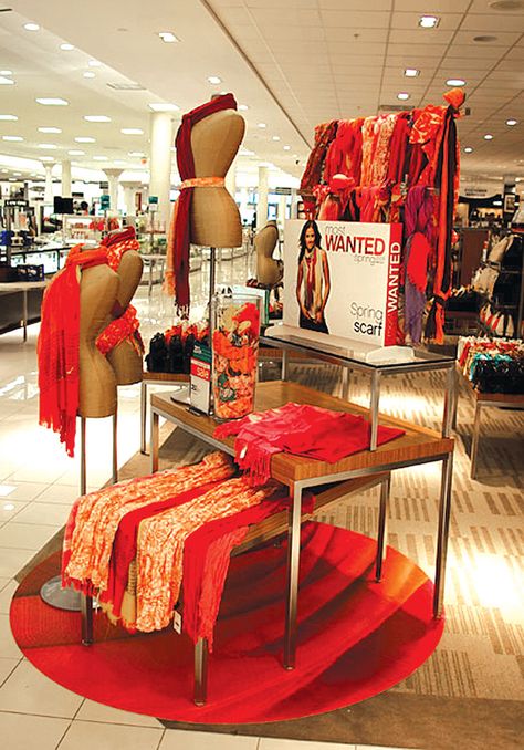 Nice Scarf display - I like the combo of mannequins + tables + scarf fixture Scarf Store Design Ideas, Table Top Scarf Display, Scarf Shop Design, Boutique Scarf Display Ideas, Scarf Display Ideas, Scarves Display Visual Merchandising, Scarf Display, Scarf Storage, Stall Display