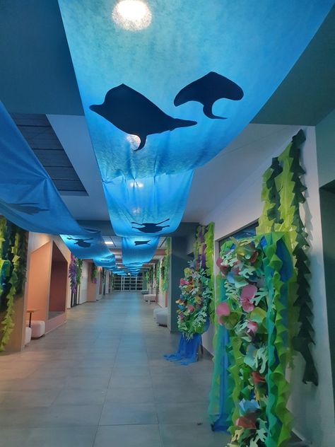 Under The Sea Cardboard Decorations, Under The Sea Crafts For Adults, Sea Backdrop Ocean Themes, Jellyfish Decorations Sea Theme, Dive Into A Good Book Display, Coral Reef Craft Diy Under The Sea, Aquatic Theme Decorations, Aquarium Party Decorations, Under Water Decoration