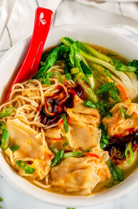 Quick 20 Minute Wonton Soup - This Chinese cuisine inspired wonton soup is so easy and quick, you'll never need order the take out version again! Dress it up with your favorite ramen noodles and leafy greens for extra yums. From aberdeenskitchen.com #quick #20minute #wonton #soup #chinesecuisine #recipe #dinner #noodles Wonton Noodle Soup, Wonton Soup Recipe, Dinner Noodles, Shrimp Wonton, Wonton Noodles, Won Ton, Ramen Noodle Recipes, Dumplings For Soup, Ramen Soup