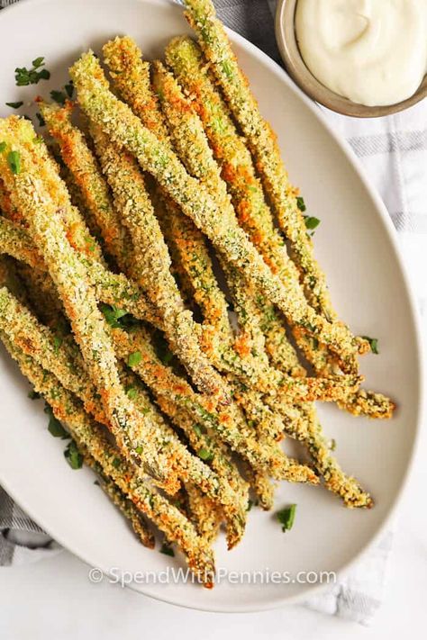 These Asparagus Fries are so easy to make! Pop them in the oven for a great appetizer or side dish along with steak, chicken or a burger! #spendwithpennies #asparagusfries #sidedish #ovenbaked #recipe #parmesan Parmesan Appetizer, Lemon Aoli, Baked Asparagus Fries, Oven Baked Asparagus, Veggie Appetizers, Asparagus Recipes Baked, Parmesan Asparagus, Bite Size Snacks, Asparagus Fries