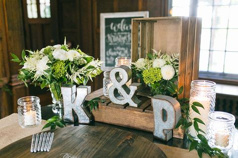 Rustic-chic welcome table for guests - wooden crates, galvanized initial letters, green and white flowers, candles, and guest "book". Willowdale Estate, a weddings and events venue in north of Boston, Massachusetts. WillowdaleEstate.com | Zev Fisher Photography Rustic Wedding Guest Book Table Decor, Rustic Welcome Table Wedding, Wedding Guest Entry Table, Wedding Gift Table Ideas Rustic, Galvanized Wedding Decor, Guest Book Table For Wedding Decorations, Rustic Wedding Welcome Table, Rustic Guest Book Table, Guest Book Table For Wedding