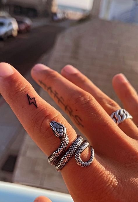 Finger Lightning Tattoo, Lightning Tattoo Finger, Lightning Finger Tattoo, Lightning Bolt Hand Tattoo, Arrow Tattoo On Finger, Lightning Bolt Finger Tattoo, Little Hand Tattoos, Thumb Tattoo, Inside Finger Tattoos