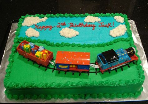 Thomas Birthday Cake - 11 x 15 sheet cake decorated with the Thomas Birthday Train.  It was a big hit!  Thanks to several on CC for inspiration! Train Sheet Cake, Thomas Birthday Cake, Sheet Cake Decorated, Thomas Birthday Cakes, Sheet Cakes Decorated, Thomas The Train Birthday, Thomas Birthday Parties, Thomas Train Cake, Thomas Cakes