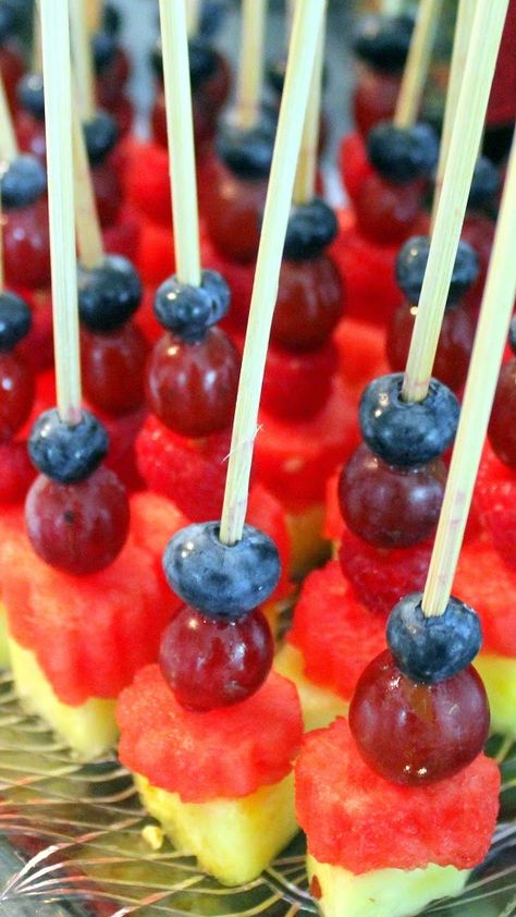 Mini Fruit on a Stick Skewers - Appetizers  Anything on a stick is fun!  Serve these up as an appetizer, or pop in the freezer for an hour and then use for a stir stick for white wine or sangria.  Simple enough to make, just a few tips and suggestions in the pin to make these beautiful fun and festive little treats! Fruit On A Stick, Skewers Appetizers, Birthday Appetizers, Fruit Appetizers Easy, Appetizers Fruit, Catering Recipes, Fruit Kabob, Fairytale Food, Fruit Sticks