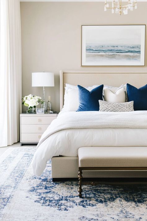 Discover the versatility of blue and cream bedrooms! From coastal chic to modern minimalism, these 25 ideas will help you create a space that reflects your personal style. Find inspiration for blue and cream bedroom decor, color schemes, and design ideas that will bring your vision to life. Blue And White Primary Bedroom, Blue And Beige Room Aesthetic, Navy Blue White And Gold Apartment, Navy And Gold Bedroom Decor, Cozy Bedroom Ideas Blue, Steel Blue Bedroom, Cream Walls Bedroom, Bedroom Decor Color Schemes, Navy And Cream Bedroom