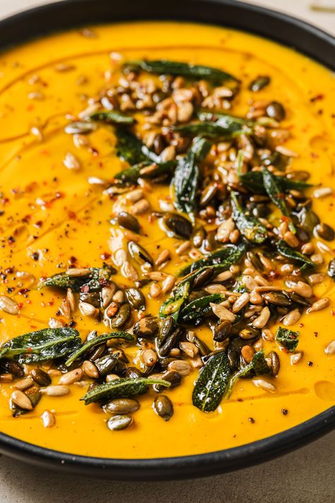 This Roasted Pumpkin Soup with Sizzled Sage is a fall showstopper that you will want to be making on repeat while pumpkins are in season. Roasted Pumpkin Soup Recipe, Roasted Pumpkin Recipes, Thanksgiving Soups, Roasted Pumpkin Soup, Carrot And Coriander Soup, Pumpkin Recipes Dinner, Roast Pumpkin Soup, Cooking Pumpkin, Pumpkin Soup Recipe