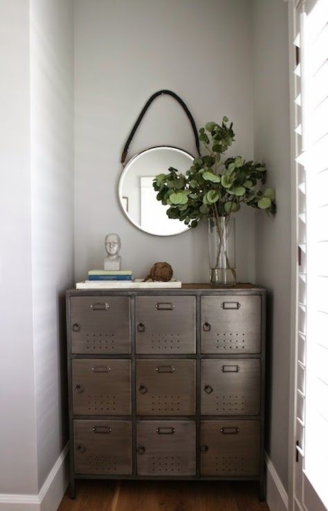 6th Street Design School - entrances/foyers - Benjamin Moore - Gray Owl - gray walls, light gray walls, metal locker cabinet, industrial locker cabinet, glass vase, entryway vignette, foyer vignette, entryway styling, captains mirror, metal captains mirror, round rope hung mirror, entry alcove, foyer alcove, gray owl, metal cabinet, rope hanging mirror, Benjamin Moore Gray Owl, Benjamin Moore Grey Owl, Benjamin Moore Gray, Locker Mirror, School Entrance, Entrance Way, Mudroom Entryway, Gray Owl, Mirror Painting