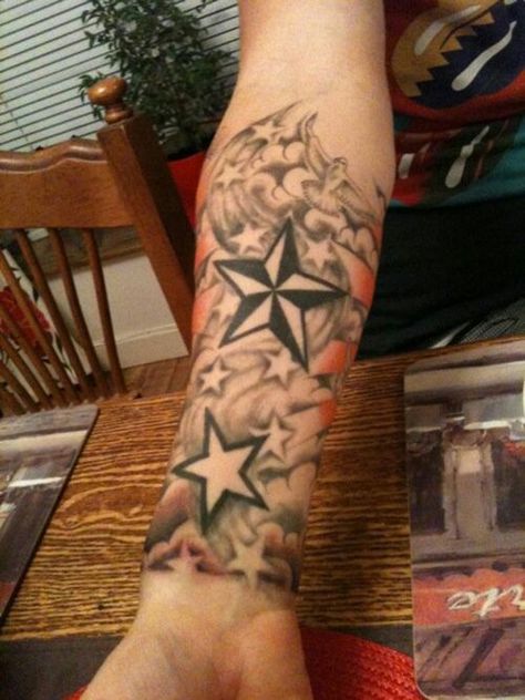 Sleeve tattoo stars Star Sleeve Tattoo, Star Tattoos For Men, Nautical Star Tattoos, Sleeve Tattoo Designs, Tattoo Sleeve Filler, Half Sleeve Tattoos, Free Tattoo Designs, Tattoo Filler, Nautical Star