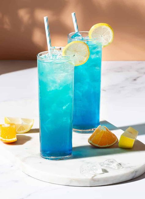 Blue Mocktail Recipe, Blue Mocktail, Summer Mocktails, Creative Drinks, Blue Curacao Liqueur, Mocktail Drinks, Rainbow Board, Sugar Free Drinks, Mocktail Recipes