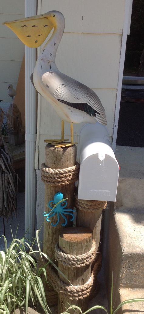 Pelican mailbox at our "beach house". Outdoor Beach House Decor, Lighthouse Mailbox Ideas, Lighthouse Mailbox Post, Pelican Mailbox Ideas, Coastal Mailbox Ideas, Surfboard Mailbox Ideas, Beach House Mailbox Ideas, Mailbox Lighthouse, Nautical Mailbox Ideas