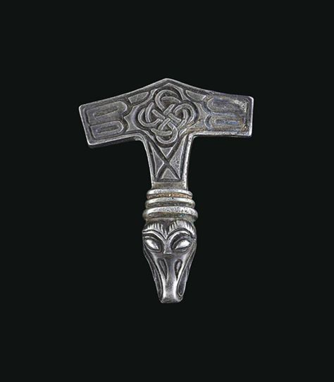 A VIKING SILVER PENDANT  CIRCA 10TH-EARLY 11TH CENTURY A.D.  Cast in the form of Thor's hammer, boat-shaped and pointed at the base, the surface embellished with an interlace design and other filling motifs, the shaft with a ribbed collar and an avian head terminal, its open beak serving as the suspension loop Princess Cut Diamond Earrings, Viking Jewellery, Thor's Hammer, Jewelry Design Inspiration, Viking Art, Jewelry Tags, 11th Century, Viking Age, Ancient Jewelry