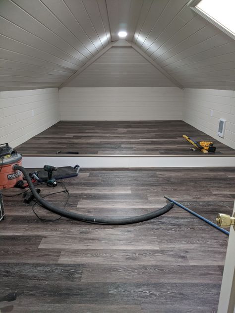 Vinyl plank floor. Tongue and groove paneling. Painted navaho white. Attic Room Renovation, Remodel Attic Space, Lighting For Attic Ceilings, Large Attic Ideas, Turning Attic Into Living Space, Short Attic Ideas, Adding Stairs To Attic, Attic Window Ideas, Bedroom Ideas Panelling