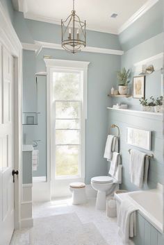 Dive into the daily routine of an interior designer as they create a coastal modern bathroom look featuring the stunning paint color SW Anchors Aweigh (SW 9179). #Ad #homedecor #homedesign #bathroom #Painthome interiorarchitecture best Wall Colors for Bathroom Colors Bright Room Colors best colors combinations bathroom bathroom Remodeling Modern Paint Colors 2024 Light Blue Restroom Ideas, Wherein Williams Bathroom Colors, Bathroom Bright Colors, Light Blue Paint For Bathroom, Color Combinations For Bathrooms, Sw Lullaby Paint Bathroom, Light Blue Walls Bathroom, Pale Blue Bathroom Walls, Beach House Wall Colors