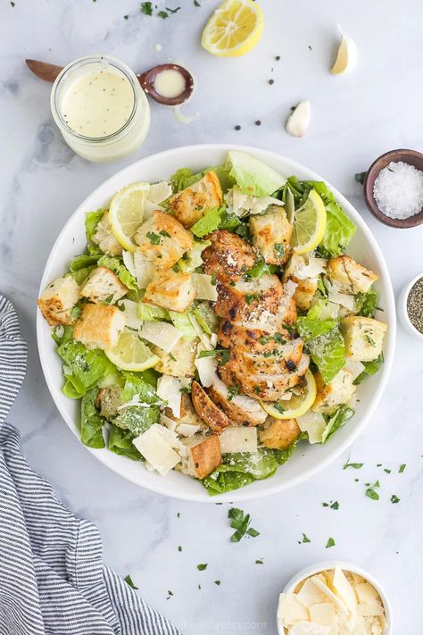 The ultimate Easy Grilled Chicken Caesar Salad, on your dinner table in 30 minutes! This Classic Caesar Salad is full of chargrilled chicken, homemade croutons, shaved parmesan and a light homemade caesar dressing. #noanchovies #healthy #easysaladrecipes #grilledchicken Salad With Homemade Dressing, Grilled Chicken Caesar, Grilled Chicken Parmesan, Chicken Caesar Salad Recipe, Chargrilled Chicken, Chicken Pasta Salad Recipes, Grilled Chicken Caesar Salad, Homemade Caesar, Chicken Caesar Wrap