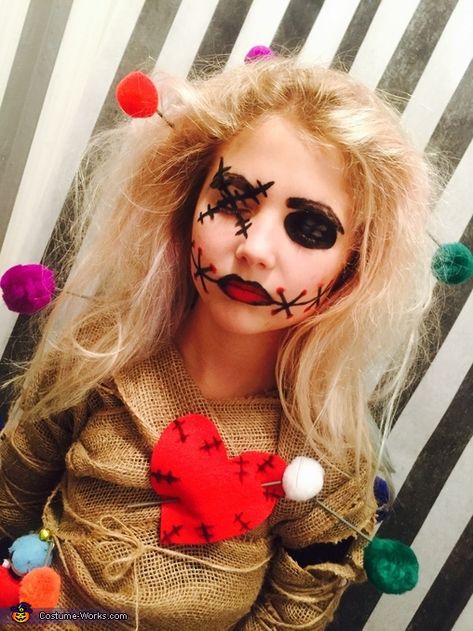 My daughter came up with the idea after last years halloween. She decided to be a voodoo doll. We used burlap, wooden dowels, Pom poms, hot glue gun, safety pins and twine to compete the look. We also used basic makeup; eyeliner, eyeshadow and lipstick. Photo 3 of 4. Voodoo Doll Makeup Easy, Voodoo Doll Halloween Costume Diy, Easy Doll Halloween Makeup, Voodoo Doll Costume Makeup, Voodoo Doll Face Makeup, Voodoo Doll, Voodoo Doll Makeup, Diy Voodoo Doll Costume, Diy Halloween Doll