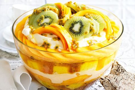 TROPICAL TRIFLE With luscious layers of cream, custard and summer fruit, this make-ahead trifle is truly tempting. Tropical Trifle, Decadent Christmas Desserts, Christmas Trifle Recipes, Trifle Cake, Fruit Trifle, Trifle Recipes, Christmas Trifle, Cream Custard, Trifle Desserts