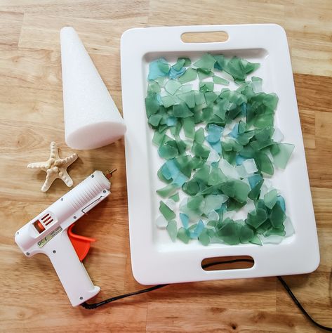 supplies to make sea glass christmas trees How To Make A Seaglass Christmas Tree, Beach Glass Christmas Tree Diy, Diy Sea Glass Christmas Tree, Sea Glass Tree Diy, Coastal Christmas Decorating Ideas, Beach Glass Christmas Tree, Diy Seaglass Art, Sea Glass Ornaments Diy, Sea Glass Christmas Tree Diy