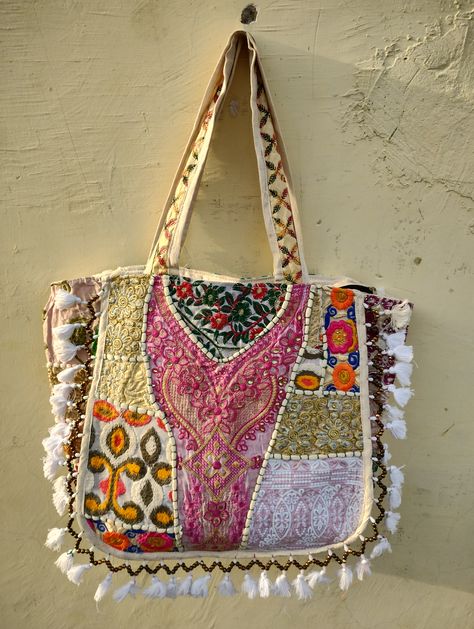 Beautiful handmade patchwork shoulder tote bags for all hand made lovers this look classy and unique becuase of its work Hippie style bag made by the artisan of tribble rajasthan people Bag Detail - Length - 15 inch Width - 18 inch Strap - 12 inch Fabric - Cotton with embroidered patches Patchwork Tote Bags, Handmade Fabric Bags, Diy Bag Designs, Bag Designs, Fabric Ideas, Look Classy, Bags Vintage, Beach Bags, Fabric Bags