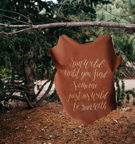 leather signage Leather Signage, Summer Solstice Wedding, Creative Wedding Sign, Solstice Wedding, Glamping Weddings, Wedding Arbors, Calligraphy Signs, Animal Hide, Boho Wedding Inspiration