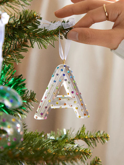 Add some vibrant hues to your holiday décor with the Color In the Season Initial Ornament. Featuring the letter of your choosing in a bold, bubble-letter font, this festive ornament is embellished with dainty multicolored stones for added sparkle. Give as a gift (or treat yourself) to an ornament that will bring joy to any home this holiday. Resin Christmas Ornaments, Initial Christmas Ornaments, Bubble Letter Fonts, Alaska Highway, Initials Ornament, Bubble Letter, Pink Christmas Tree, The Night Before Christmas, Christmas Mood