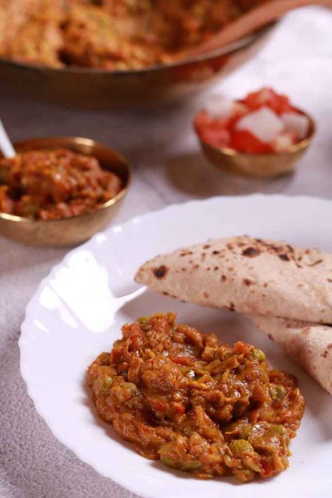 Baigan ka Bharta - Smoky Flavors and Rich Traditions. Baigan Ka Bharta Recipe, Baigan Bharta Recipe, Baigan Ka Bharta, Bharta Recipe, Indian Bread, Fresh Spices, Different Vegetables, Ripe Tomatoes, Indian Food Recipes Vegetarian