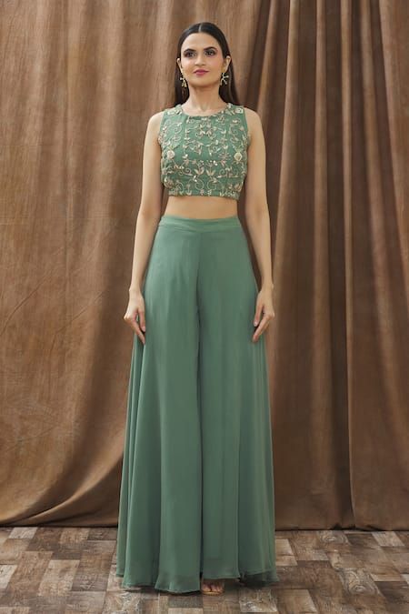 Buy Green Georgette Embroidery Thread Round Crop Top And Palazzo Set For Women by Gaurav Katta Online at Aza Fashions. Plazzo Sets Indian Wedding, Plazzo With Top Outfit Traditional, Party Wear Palazzo With Crop Top, Crop Top With Pants Indian, Crop Top Palazzo Indian, Traditional Palazzo And Crop Top, Green Plazo Outfit, Palazzo Skirt Outfit, Plazzo Set Designs