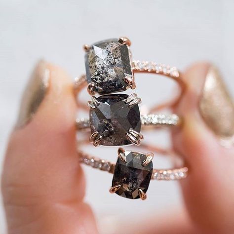 An incredible trio of black and grey salt and pepper 'galaxy' diamonds by @pointnopointstudio_ . New favourite designer!! All their designs are breath taking and conflict free - even better ❤️ Rose Gold Diamond Ring Engagement, Pearl Engagement Ring, Diamond Cluster Engagement Ring, Cluster Engagement Ring, Rose Engagement Ring, Unique Engagement, Salt And Pepper Diamond, Rose Gold Engagement Ring, Unique Engagement Rings