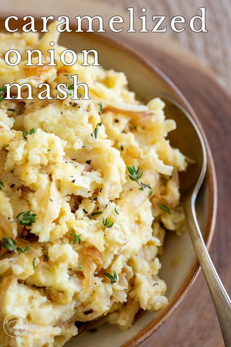 These Caramelized Onion Mashed Potatoes are the perfect balance between simplicity and indulgence. The velvety, buttery, creamy mashed potatoes are infused with rich, sweet-savory caramelized onions and a sprinkle of thyme. Giving you a side dish with the warmth and comfort that good food brings. So whether you're gearing up for a festive holiday feast, a hearty Sunday roast, or a simple midweek meal with chicken or steak, this recipe is your ticket to comfort-food heaven. Mashed Potatoes And Onions, Carmelized Onion Mashed Potatoes Recipe, Mashed Potatoes With Onions, Carmalized Onion Mashed Potatoes, Caramelized Onion Mashed Potatoes, Cowboy Mashed Potatoes, Onion Mashed Potatoes, Meal With Chicken, Potatoes Dishes