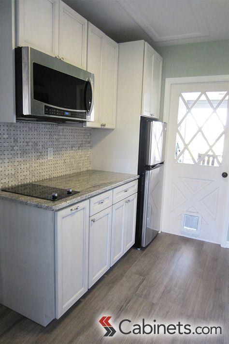 Compact, cute white kitchen in a mother-in-law suite. #kitchenspiration Cute White Kitchen, Basement In Law Suite, Basement Suite Ideas, Mother In Law Suite, Mother In Law Apartment, Mother In Law Cottage, Inlaw Suite, Basement Kitchenette, In-law Apartment